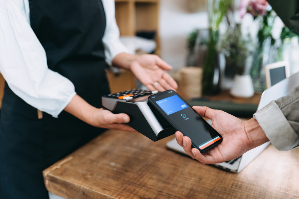 Cell phone next to payment machine